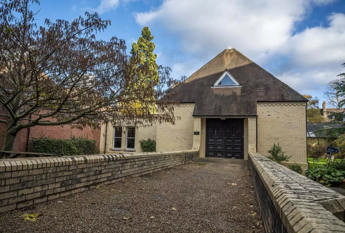 A low building with a pyramid roof - home to Human Sciences